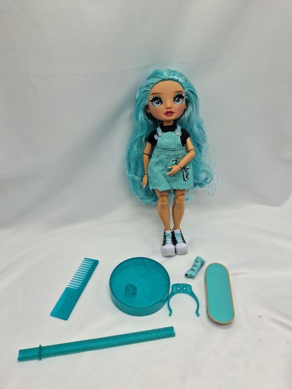 Rainbow High Blu Brooks Doll - Loose / Partial Set with Cast & Skateboard